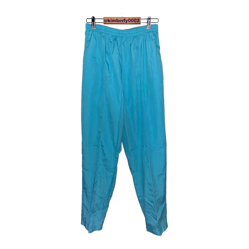 Aqua blue women’s scrub pants by Peaches Uniforms.